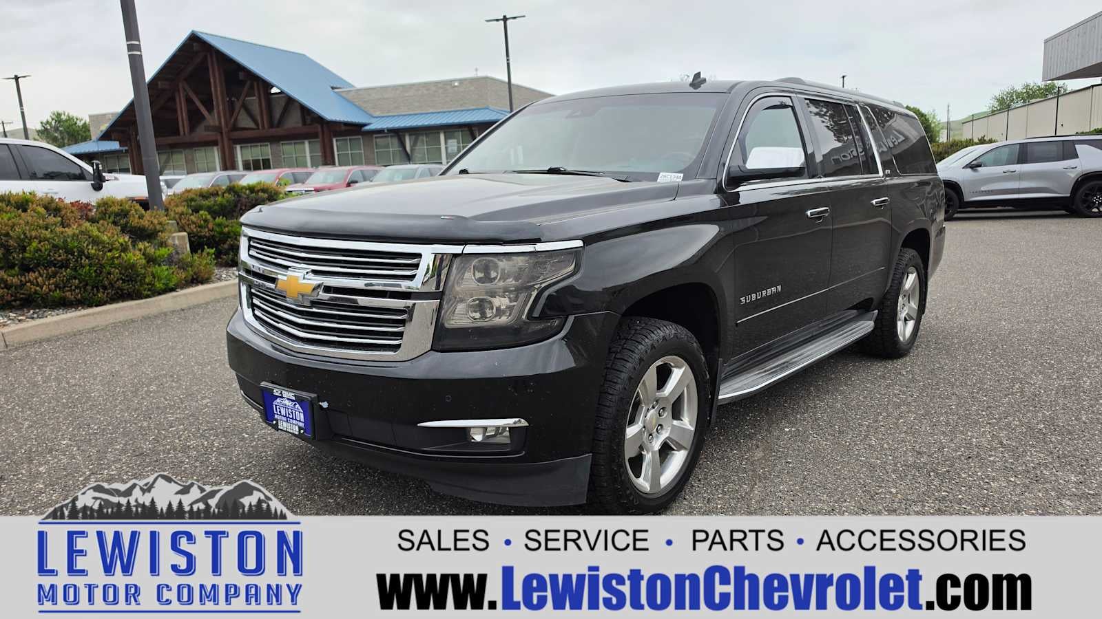 2015 Chevrolet Suburban LTZ in Black — front three-quarter view