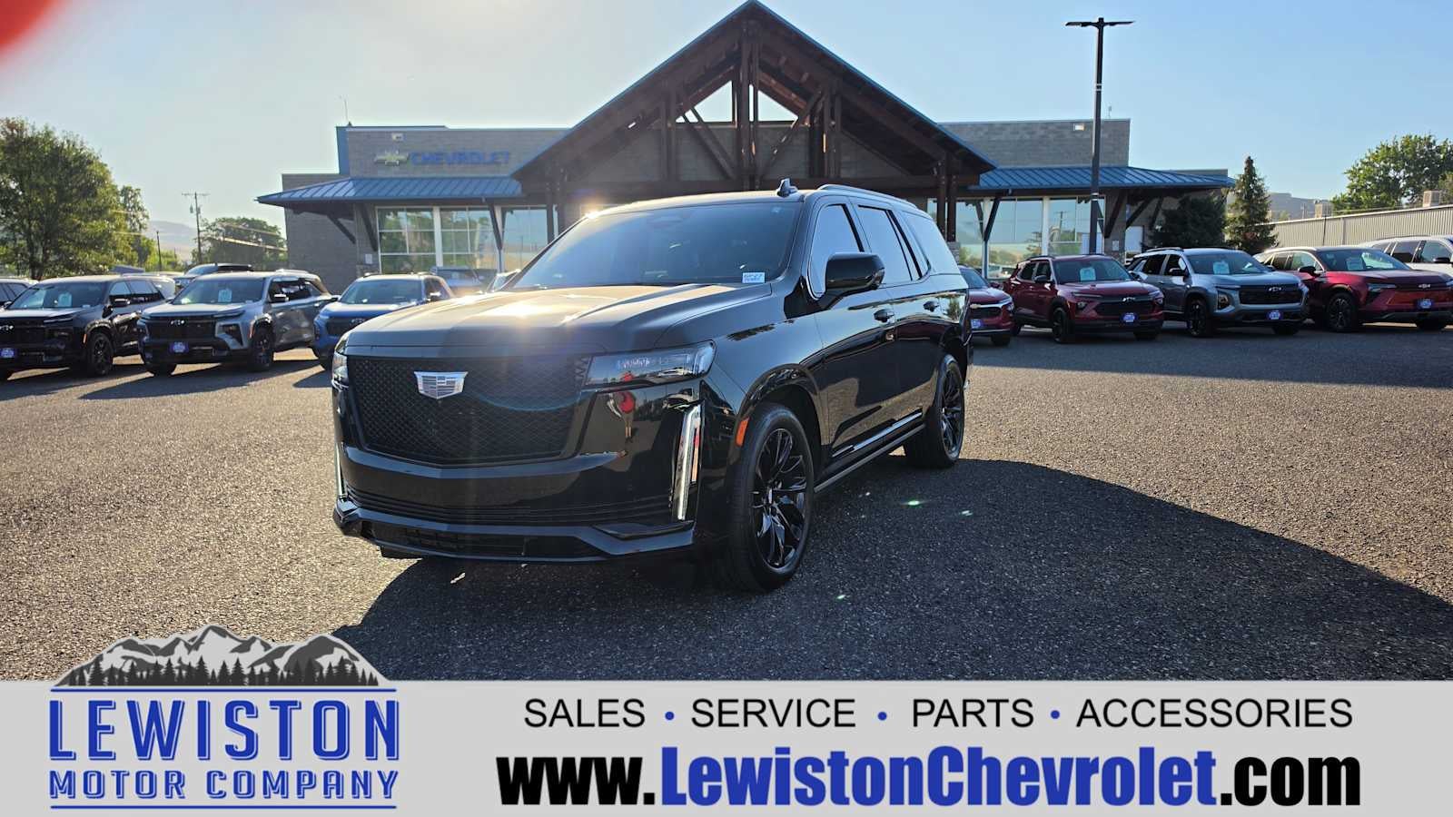 2022 Cadillac Escalade Sport Platinum in Black Raven — front three-quarter view
