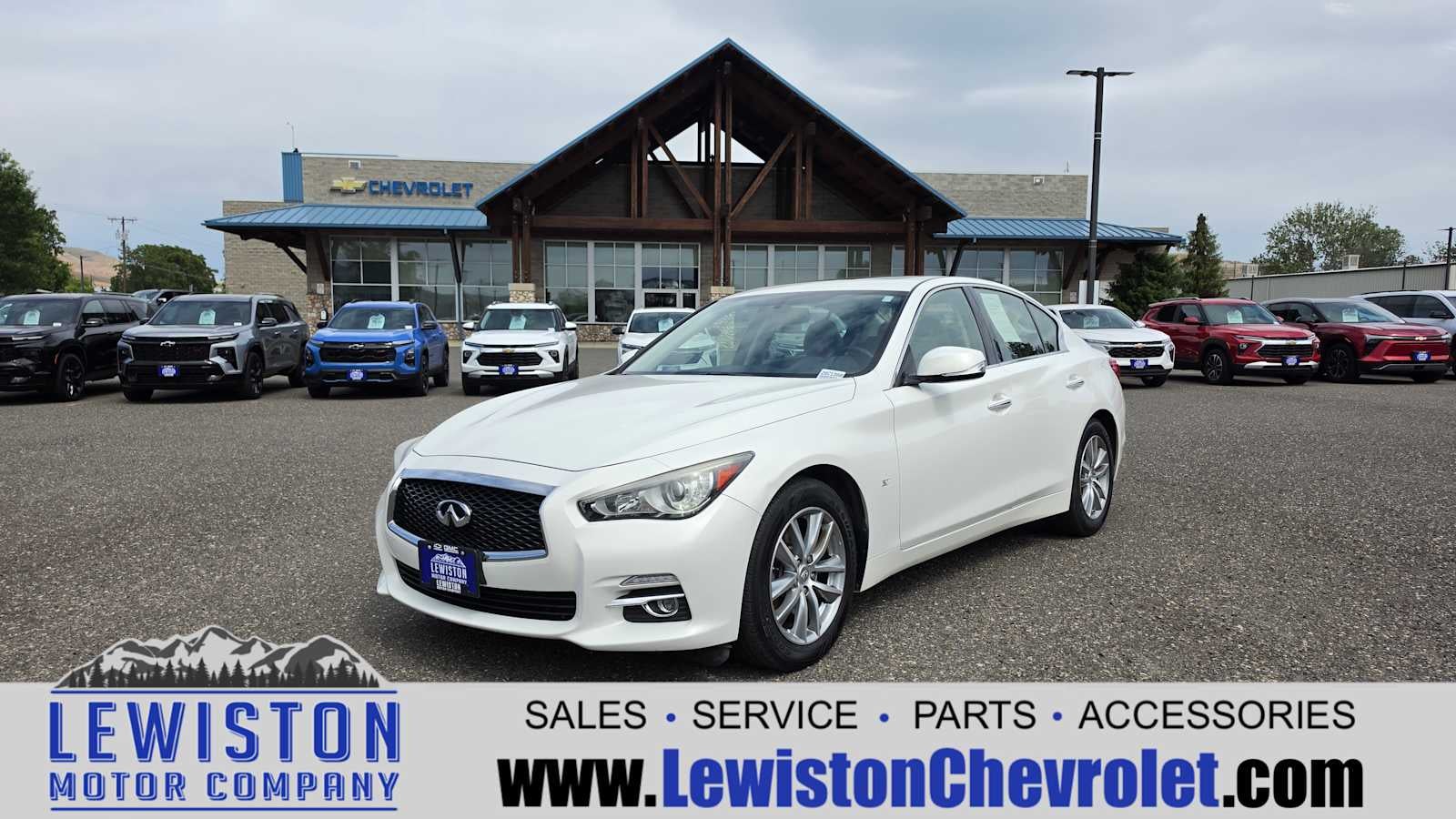 2014 INFINITI Q50 Premium in White — front three-quarter view
